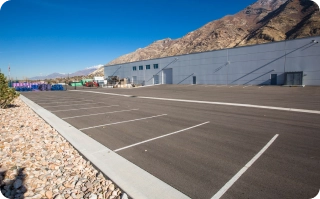 empty parking lot next to a business